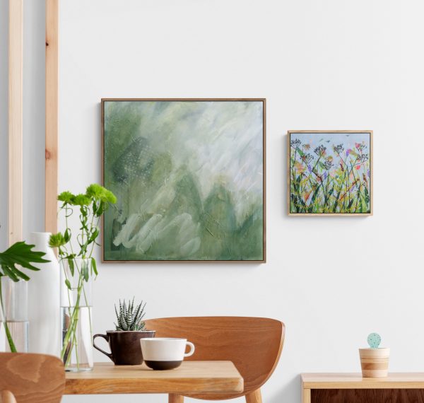 show paintings called sylvan and la la lavender on a dining room wall